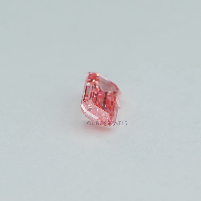 side view of pink elongated emerald cut diamond lab grown loose