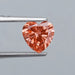 0.90ct vivid pink heart shaped lab grown diamond loose held with tweezer