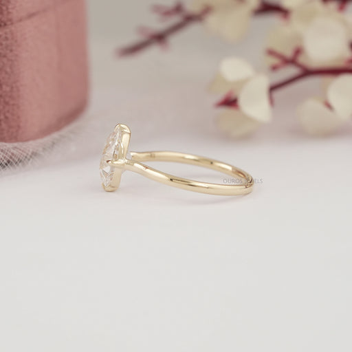 side view of old mine oval cut lab diamond solitaire wedding ring