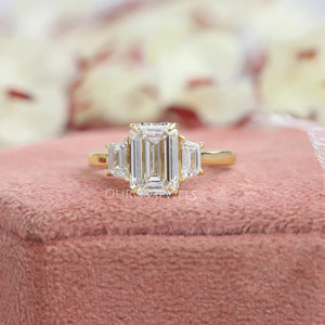 3 stone emerald cut diamonds rings 