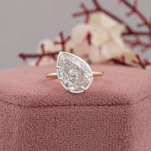 pear solitaire diamond ring