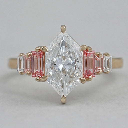 front view of dutch marquise cut with baguette diamond engagement ring on fabric