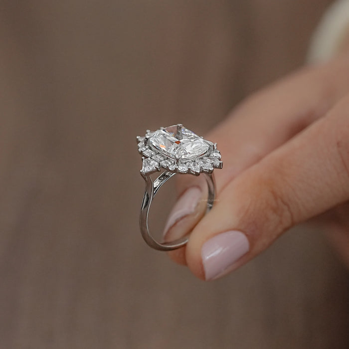 elongated cushion diamond with baguette and round halo wedding ring's side view