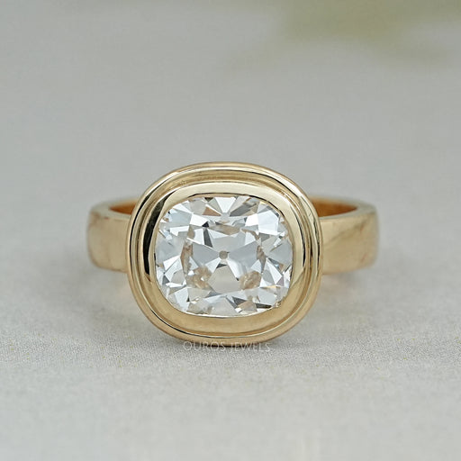 top view of old mine cushion cut lab diamond bezel solitaire engagement ring