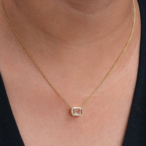  emerald cut bezel set diamond pendant