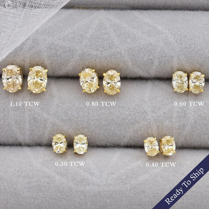 front view of yellow oval cut lab grown diamond screw back earrings gold