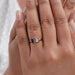 opal and sapphire emerald diamond open cuff toi et moi wedding ring on model's finger