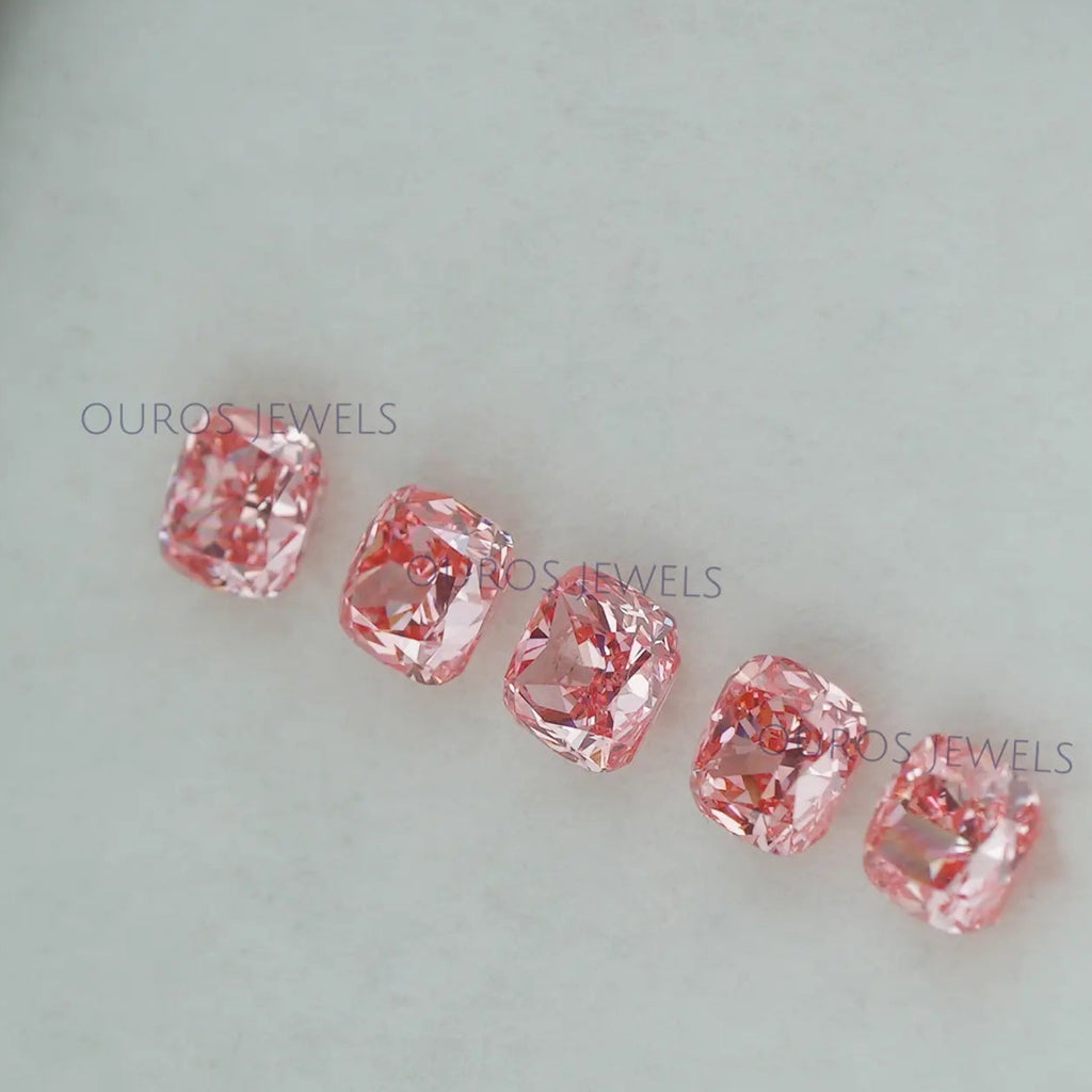 side view of each pink cushion cut man made diamonds loose