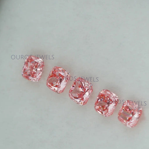 side view of each pink cushion cut man made diamonds loose