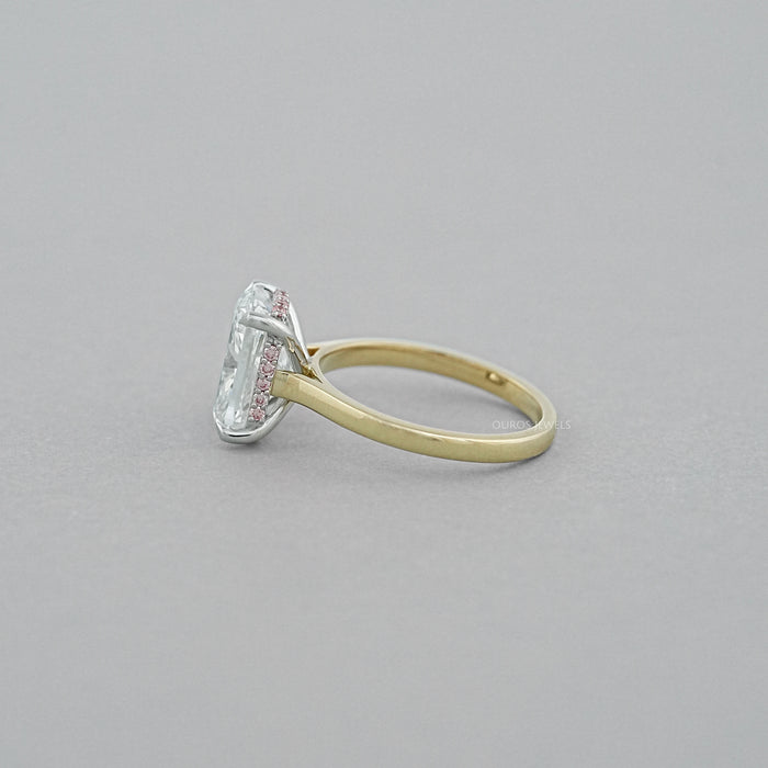 side view of cushion-cut lab diamond pink hidden halo solitaire colored wedding band