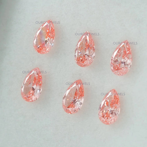 side view of 0.33 ct pink pear shaped lab made diamonds loose