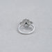 back view of princess black diamond half moon halo engagement ring