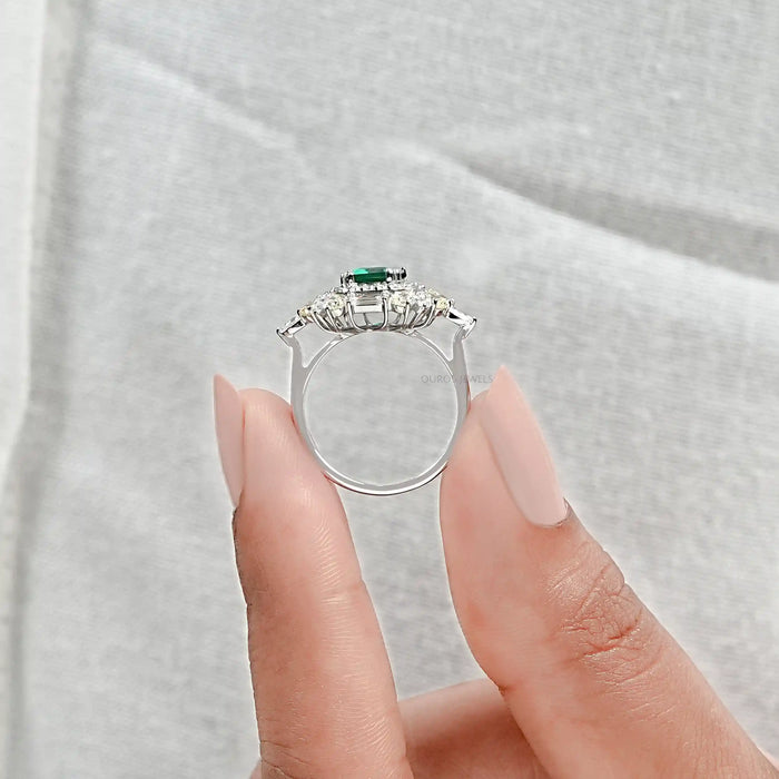 emerald gemstone and diamond engagement ring 
