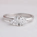 front view of double heart-shaped lab diamond toi et moi wedding ring on fabric