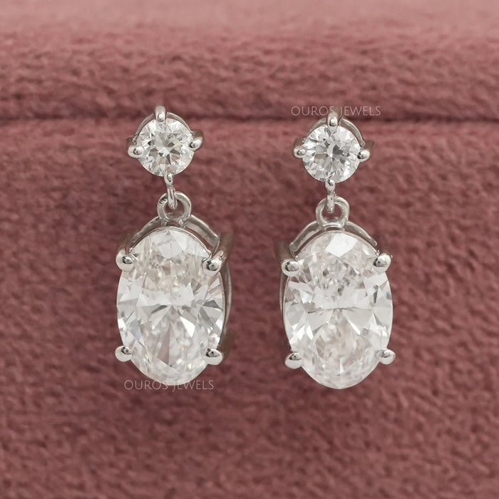 front view of round and oval cut lab grown diamond drop dangle earrings