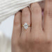 dutch marquise cut diamond hidden halo engagement ring front view in finger