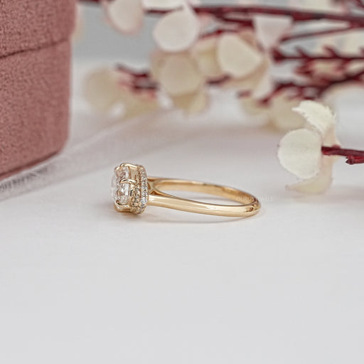 side view of east west marquise diamond hidden halo engagement ring