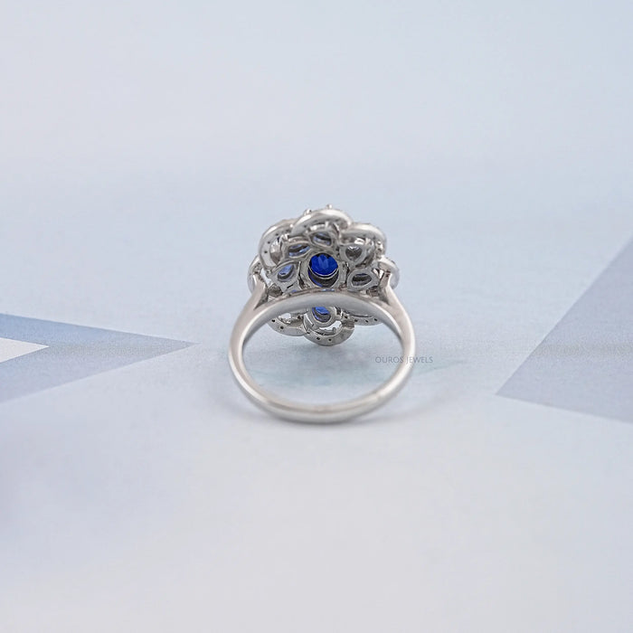 Blue Sapphire and Diamond Floral Halo Ring