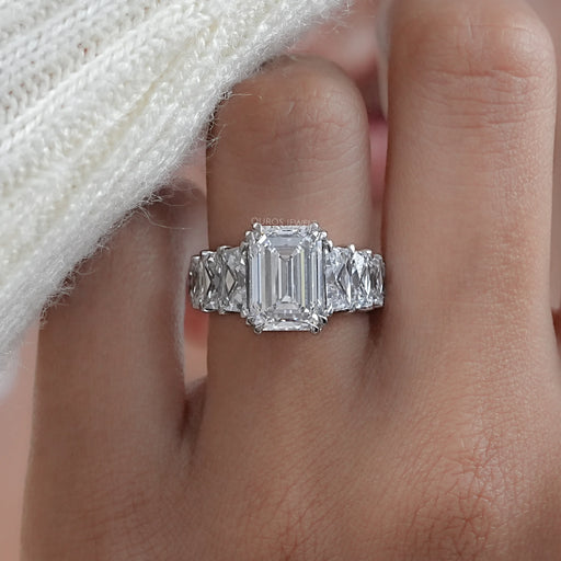 front view of emerald-cut lab diamond trapezoid solitaire accent engagement ring