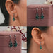 emerald drop earrings with black enamel flush set 
