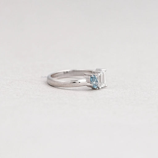 side view of two stone emerald cut diamond toi et moi wedding ring white gold