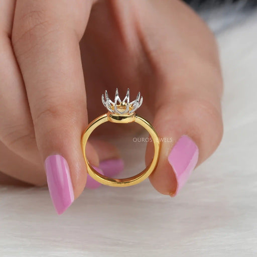 close view of round-shaped flower-style semi-mount solitaire engagement ring