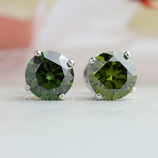front view of green round cut lab grown diamond stud earrings white gold