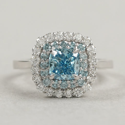 front view of fancy blue cushion cut lab diamond double halo wedding ring