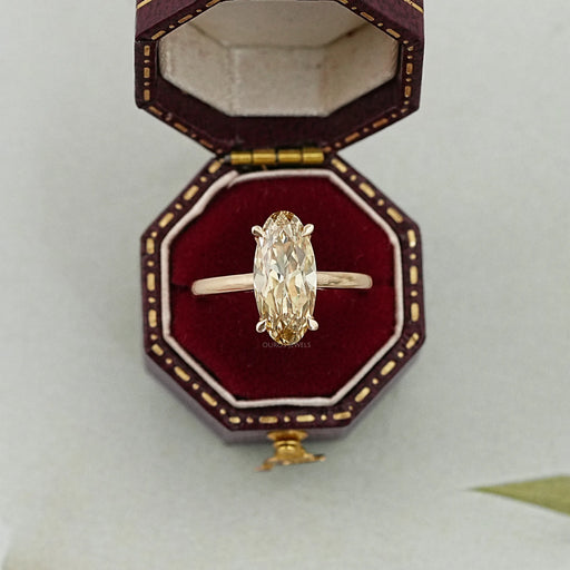 old mine moval cut diamond 4 prong set solitaire ring in jewelry box