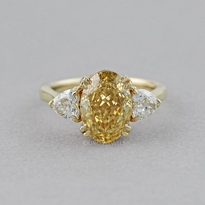 Fancy Vivid Yellow Oval Cut Hidden Halo Three Stone Ring