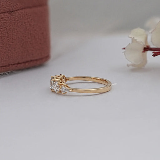 side view of round and kite cut lab diamond five stone engagement ring