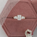 radiant cut lab grown diamond five stone engagement ring in jewelry box