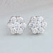 front view of floral round cut halo diamond stud earrings white gold