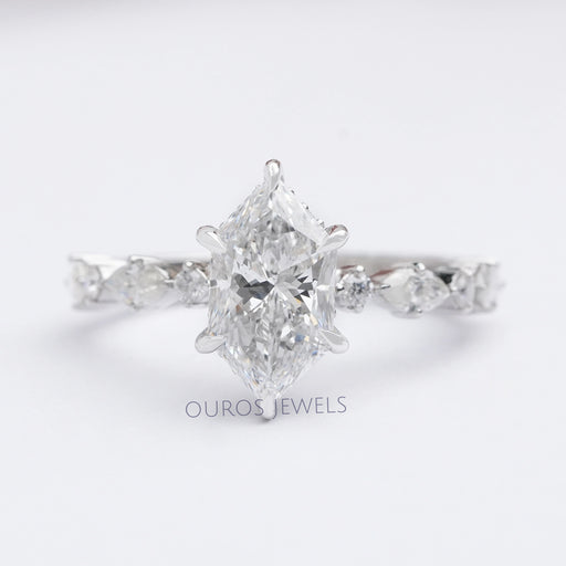 front view of dutch marquise cut and solitaire accent diamond ring on grey fabric