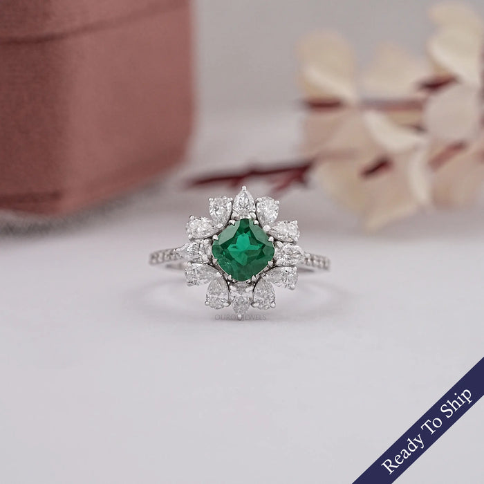 green colroed cushion cut gemstone ring