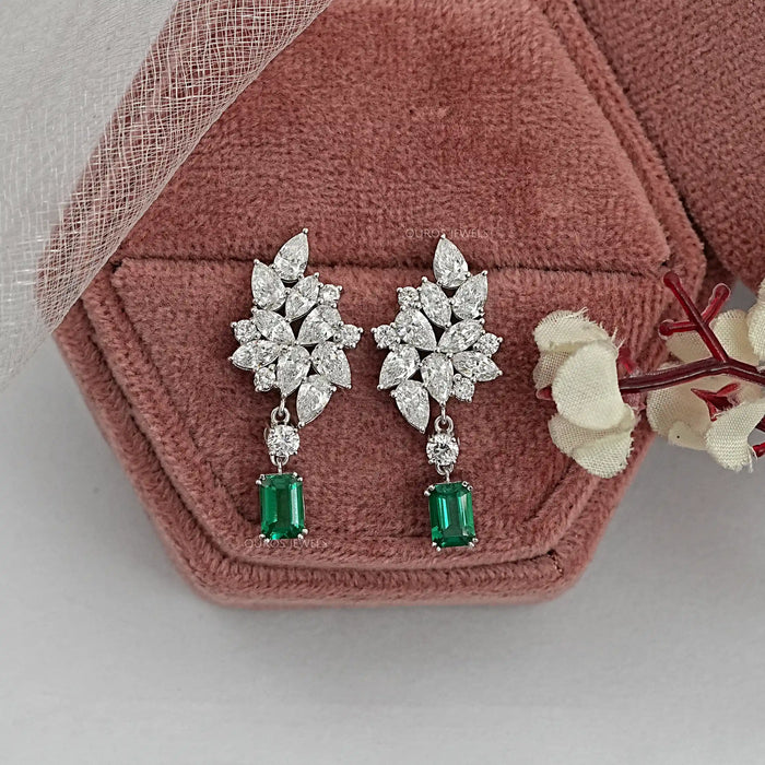 emerald gemstone and cluste diamond drop earrings
