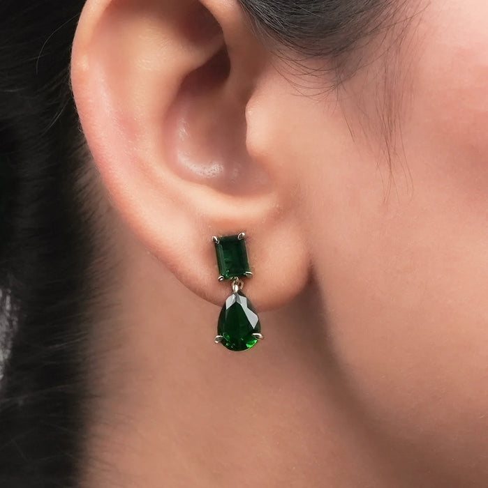 green emerald and pear gemtsone claw prongs drop earrings yellow gold on ear