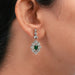 green gemstone and diamond drop earring