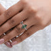 green marquise-cut lab-grown diamond solitaire accent wedding ring in finger