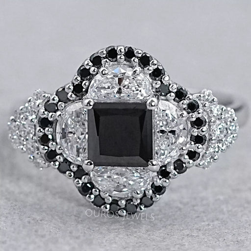 top view of princess black diamond with half moon halo engagement ring