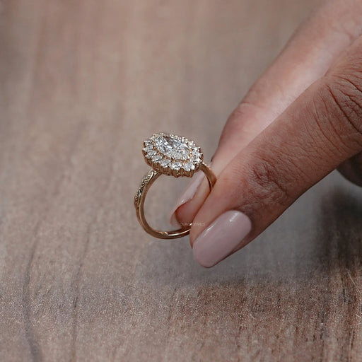 side view of marquise cut lab diamond halo set engagement ring