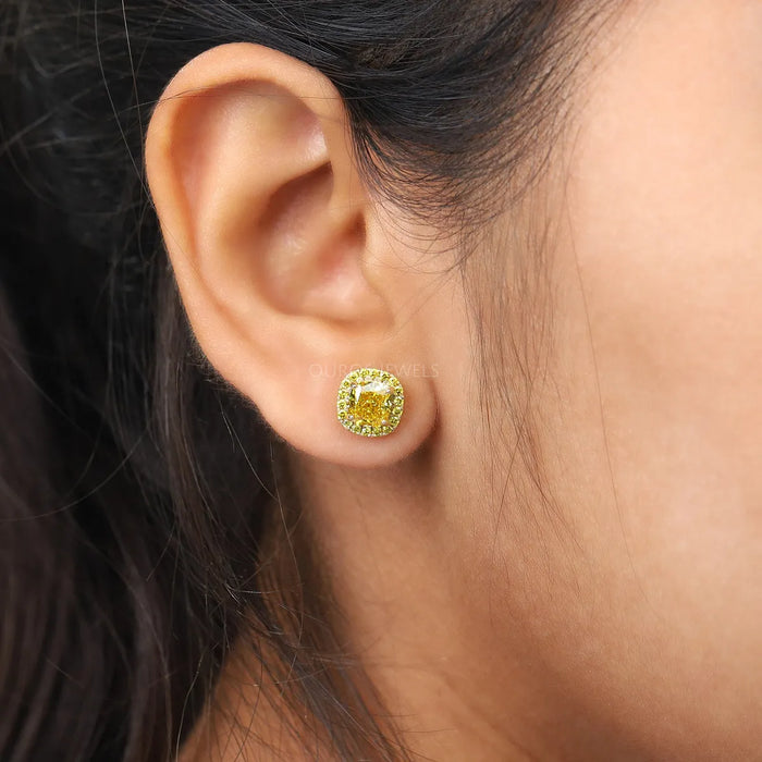 yellow cushion cut lab diamond yellow gold stud earrings halo showed in ear