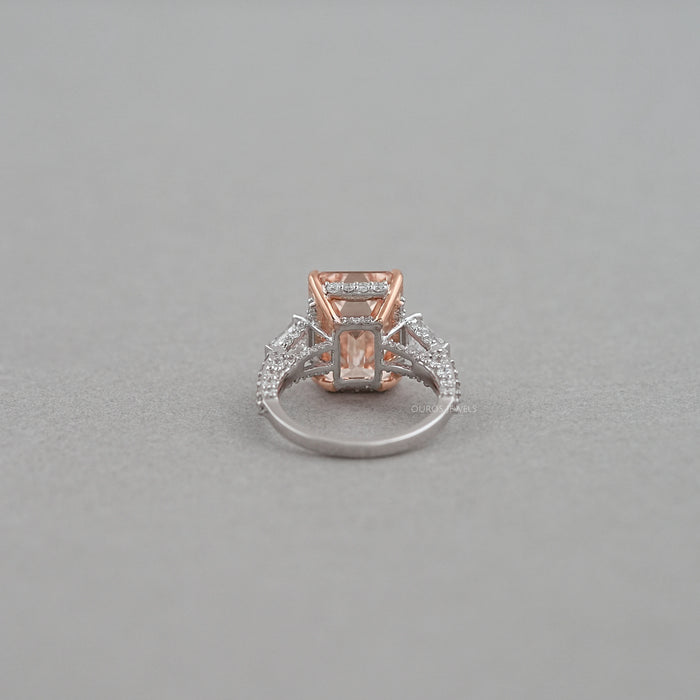 back view of pink emerald diamond three-stone hidden halo colored engagement ring