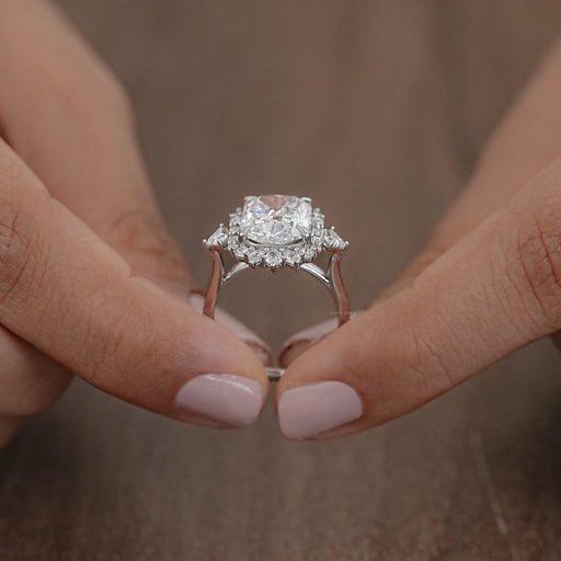 elongated cushion diamond with baguette and round halo wedding ring's close view