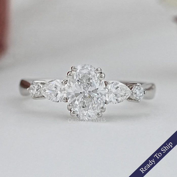 front view of oval and pear cut lab diamond five stone engagement ring