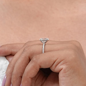 Oval Shape Solitaire With Accent Ring