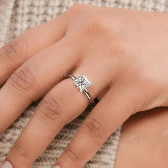 princess cut certified lab diamond engagement ring in finger