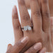 pear and cushion-cut diamond hidden halo toi et moi engagement ring on model's finger