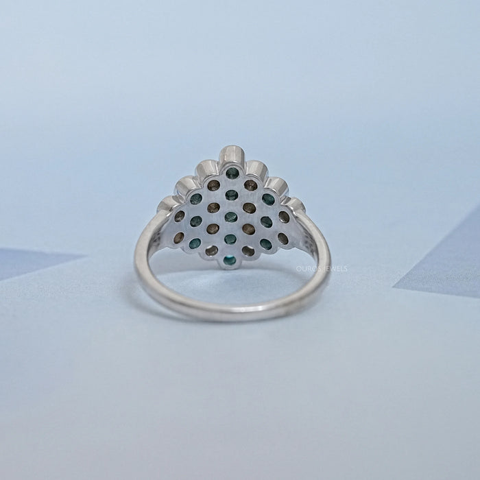 back view of round cut paraiba gemstone bezel set engagement ring