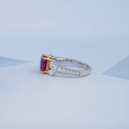 side view of pink ruby cushion cut gemstone solitaire split-shank wedding ring
